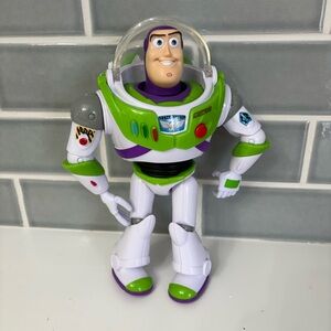Mattel Disney and Pixar Toy Story Talking Buzz Lightyear Action Figure.
